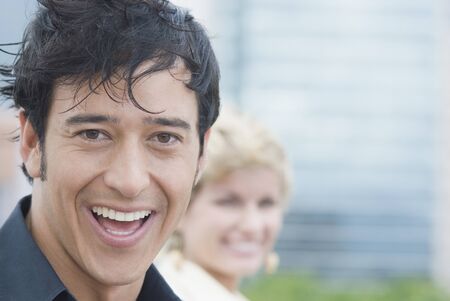 Hispanic man smiling outdoorsの写真素材