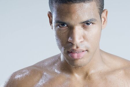 Close up of wet African manの写真素材