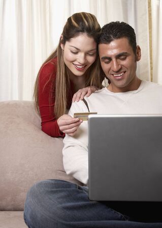 Hispanic couple shopping onlineの写真素材