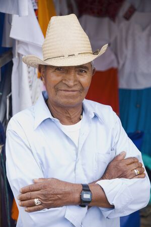 Senior Hispanic man wearing hatの写真素材