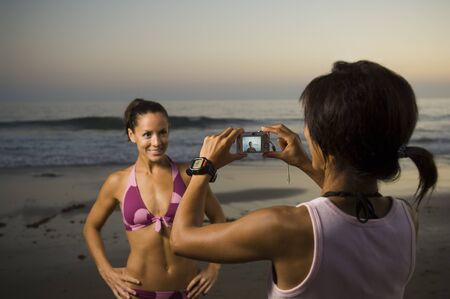 Multi-ethnic friends taking photographの写真素材