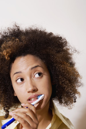 African woman brushing teethの写真素材