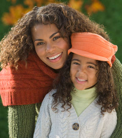 African mother hugging daughterの写真素材