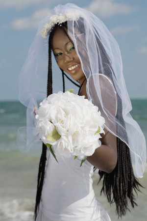 African bride holding bouquetの写真素材
