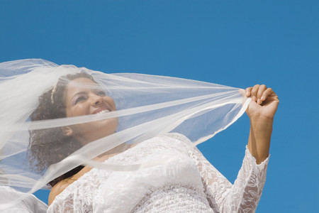 Low angle view of Hispanic brideの写真素材