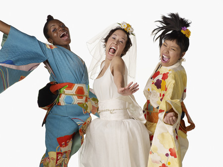Asian bride with bridesmaids in traditional clothingの写真素材