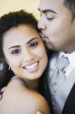 Multi-ethnic couple huggingの写真素材