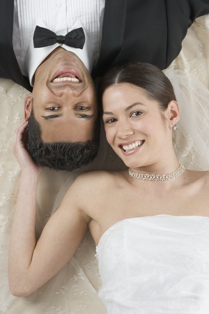 High angle view of a young newly wedded couple smilingの写真素材