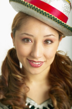 Portrait of a young woman wearing a hatの写真素材