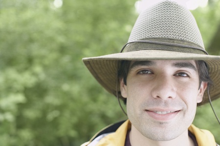 Young man wearing a hat outdoorsの写真素材