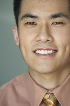 Closeup of young man smiling at cameraの写真素材