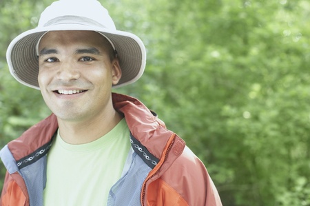 Young man wearing a hat outdoorsの写真素材