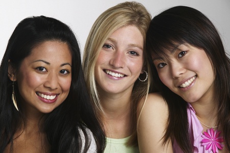Young women posing for the camera togetherの写真素材