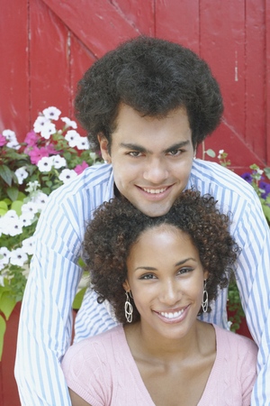 Young couple smiling for the cameraの写真素材