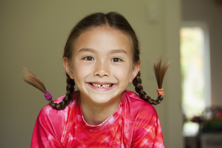 Grinning mixed race girl