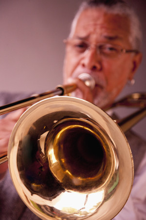Musician playing tromboneの写真素材