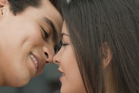 Hispanic couple kissingの写真素材