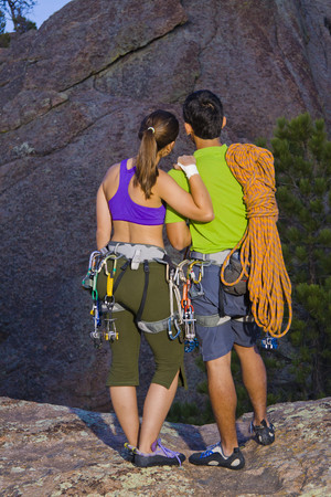 Couple preparing for rock climbingの写真素材