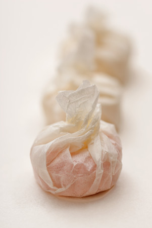 Close up of candy in wrapped paperの写真素材
