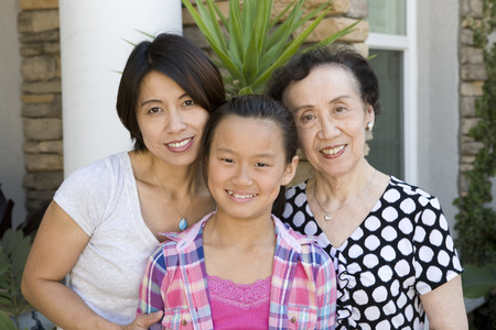 Smiling Chinese multi-generation family