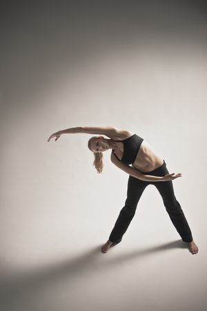 Caucasian woman stretching and exercisingの写真素材