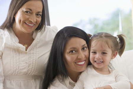 Hispanic grandmother, mother and daughter
