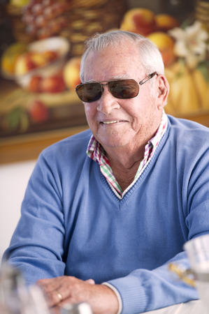 Smiling Hispanic man in sunglassesの写真素材