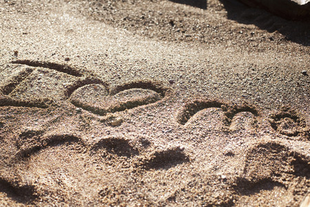 I heart me written in the sandの写真素材