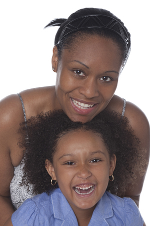 Smiling mixed race mother and daughterの写真素材