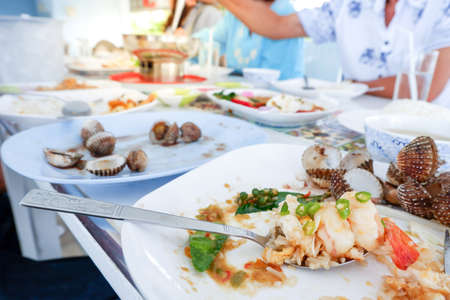 Seafood lunch time in a restaurant.の写真素材