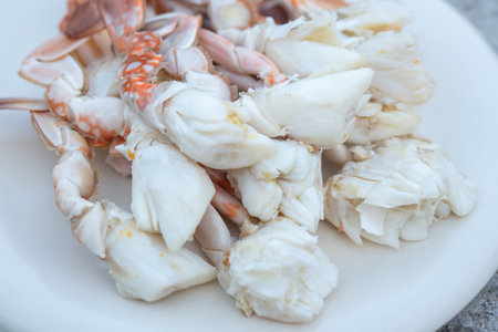 Steamed crab meat on white plate.の写真素材