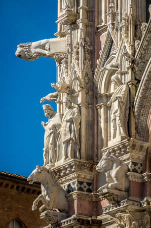 Detail of the facade of the Siena Cathedral Santa Maria Assunta 1220-1370. Tuscany, Italy, Europeの写真素材