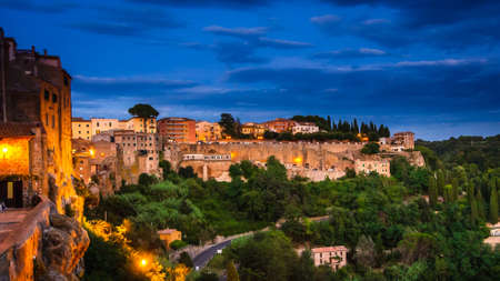 Panoramic view of an old town Pitigliano at the dusk, small old town in Maremma Region in Tuscany, Italy.の写真素材