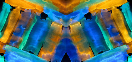 Blue, green and orange watercolor strokes are parallel, grouped and create a pattern on a black...