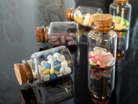Background with medicines for industry, business, pharmacies and clinics. Tablets and capsules in...