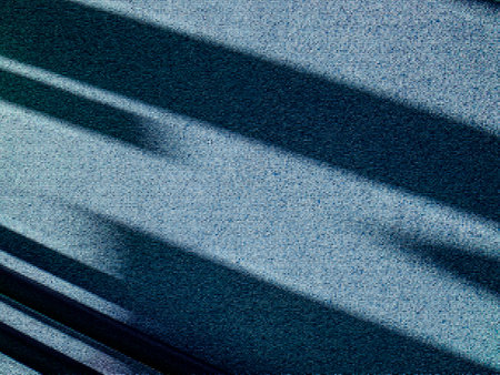 Abstract blue-gray textured background with parallel stripes placed at an angle. Copy space. Illustration.の写真素材