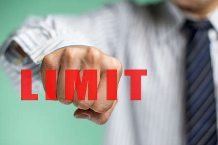 A business man want to overcome the limit to upgradeの写真素材