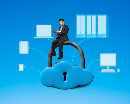 Using tablet and sitting on cloud shape locker with devices drawing