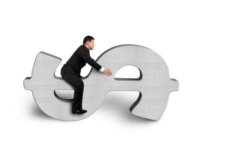 Riding on concrete money symbol isolatedの写真素材