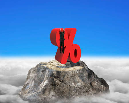 Businessman hanging on red percentage sign with euro mountain peak sky cloudscape backgroundの写真素材