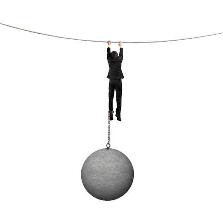 Businessman shackled by heavy concrete ball hanging on the rope with white backgroundの写真素材