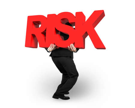 Man carrying big red RISK 3D word isolated on white backgroundの写真素材