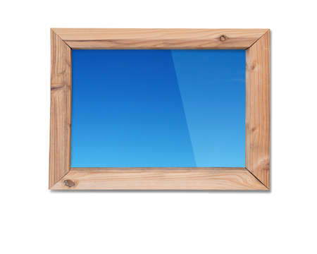 Wooden frame window with view of blue sky, isolated on white background.の写真素材