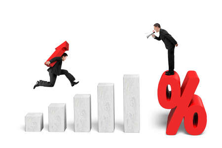One businessman using speaker shouting on percentage mark, another carrying arrow up sign jumping on 3D growing bar graphs, isolated on white.の写真素材