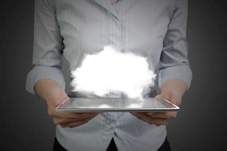 Woman hands holding smart phone of black touchscreen with white cloud.の写真素材
