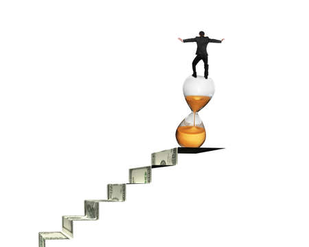 Businessman balancing hourglass on top of money stairs, isolated on white.