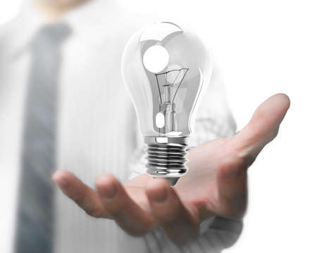 Businessman hand holding light bulb with glass transparent reflection.