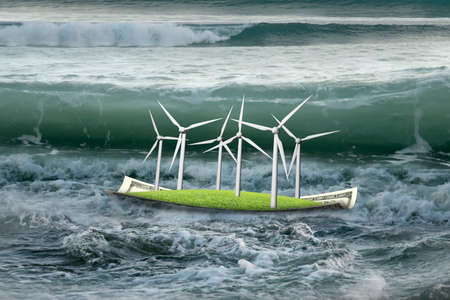 Wind turbines on money boat floating in the ocean with oncoming wave