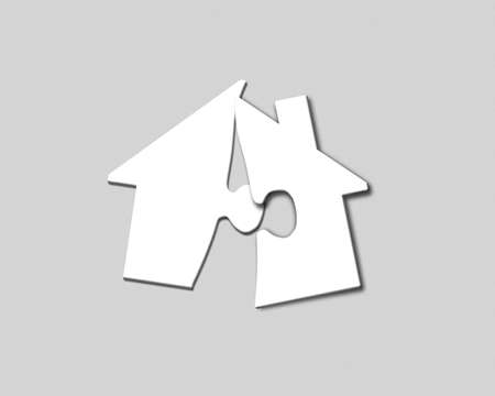 Blank white house shape puzzles, on gray background.の写真素材