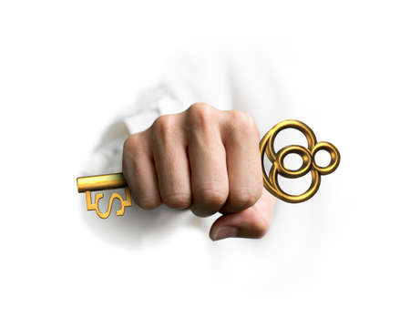 Hand holding big golden treasure key in dollar sign shape, isolated on white background.